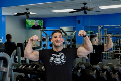 Russell Matmon, personal trainer at Pump Fitness, coaching a session